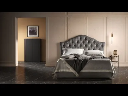 Letto in tessuto lavorazione capitonné con testiera sagomata Queen di Bside