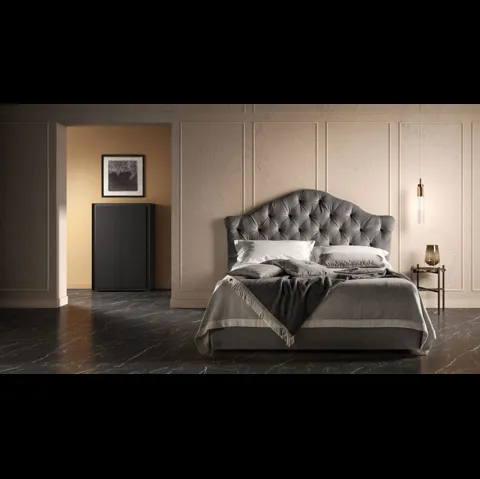 Letto in tessuto lavorazione capitonné con testiera sagomata Queen di Bside