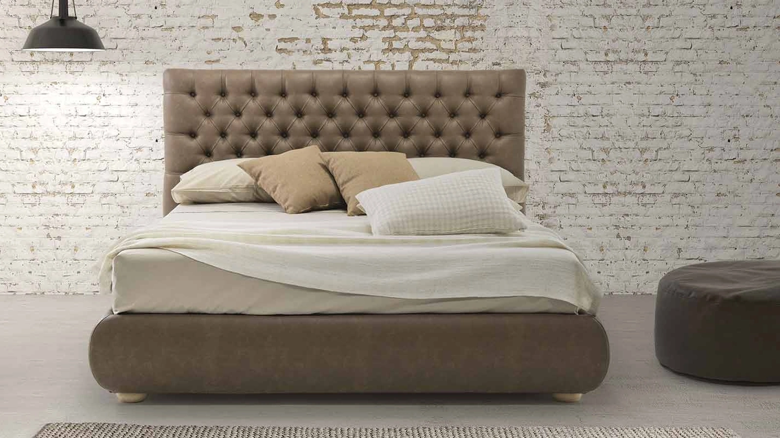 Letto in pelle Sirio con testiera trapuntata di Rimar