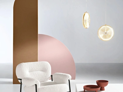 Poltrona Kent in tessuto bouclè di Ikone Casa