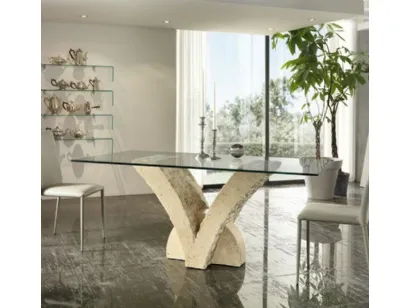 Tavolo con base scultorea in pietra fossile e top in vetro Papillon di Stones